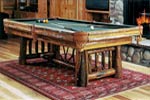 The Wilderness Madison Billiard Table - beetle-tracked, trestle, pine, naturally distressed, lodgepole pine logs, rustic